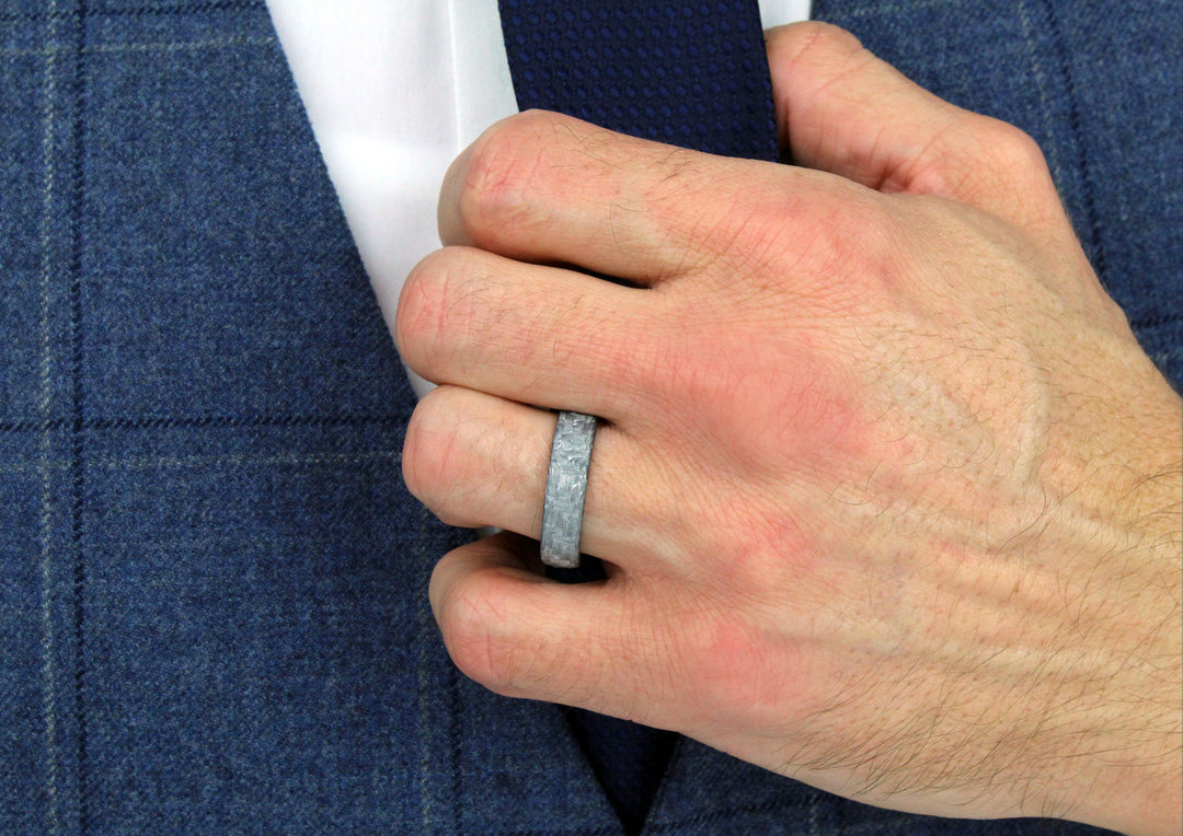 Model wearing 'White' Carbon Fibre ring, 6mm wide, 2.6mm deep, Comfort court profile, 52628-002-000-N002
