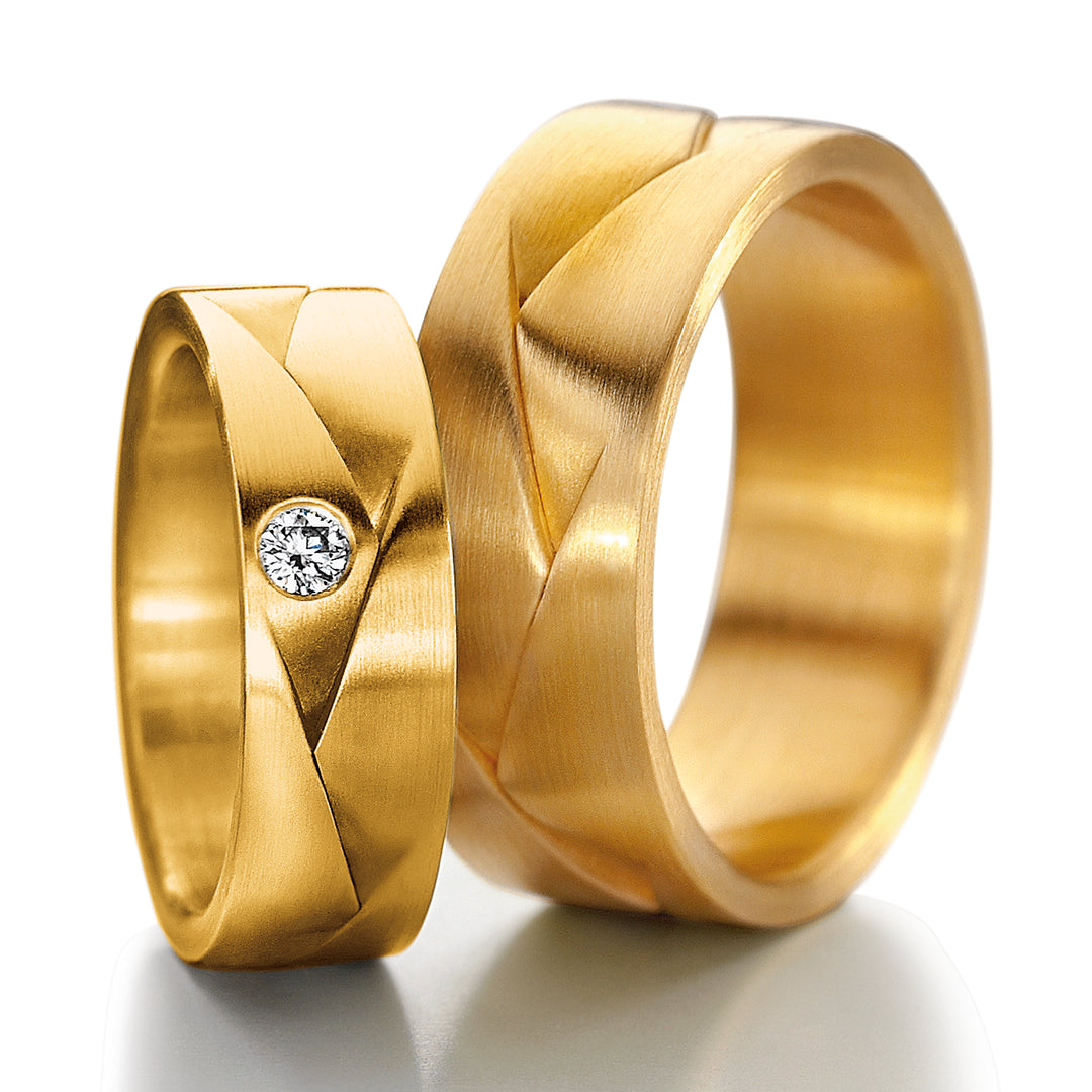 Pair of Furrer Jacot Origami rings, one plain & one diamond set in 18ct Yellow Gold