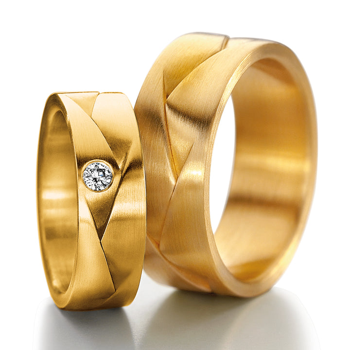 Pair of Furrer Jacot Origami rings, one plain & one diamond set in 18ct Yellow Gold