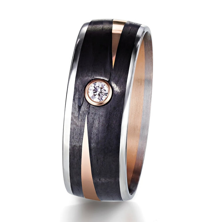 Palladium 18ct Rose Gold & Black Carbon Fibre ring set with 1 round 'brilliant cut' diamond, 0.04ct graded F/G 7mm wide, 1.7mm deep AVAILABLE NOW IN SIZE 55 (UK N 1/2) 