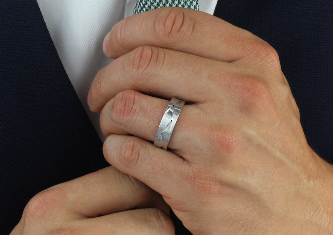 Model wearing Palladium ORIGAMI ring, 6mm wide , 1.8mm deep, AVAILABLE NOW IN SIZE 62 (UK T) centre (2)