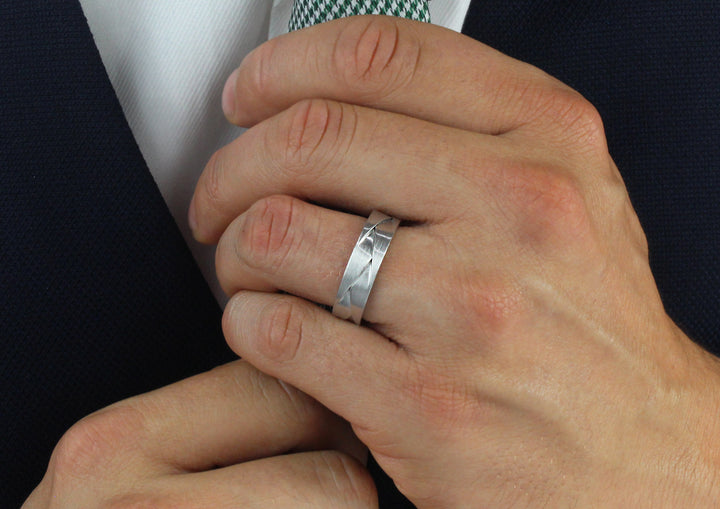 Model wearing Palladium ORIGAMI ring, 6mm wide , 1.8mm deep, AVAILABLE NOW IN SIZE 62 (UK T) centre (2)