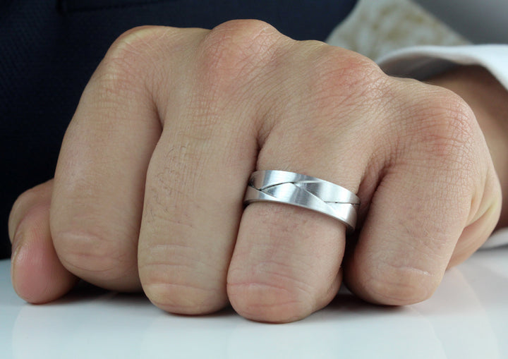 Model wearing Palladium ORIGAMI ring, 6mm wide , 1.8mm deep, AVAILABLE NOW IN SIZE 62 (UK T) centre