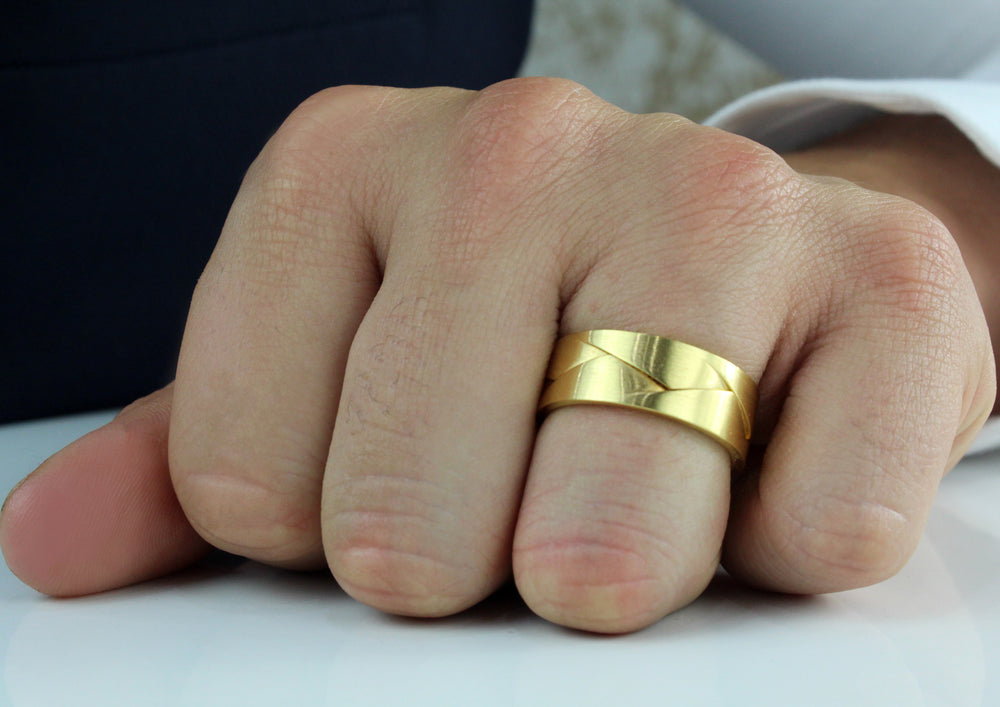 Model wearing 'Origami' Ring - 8mm wide in 18ct Yellow Gold