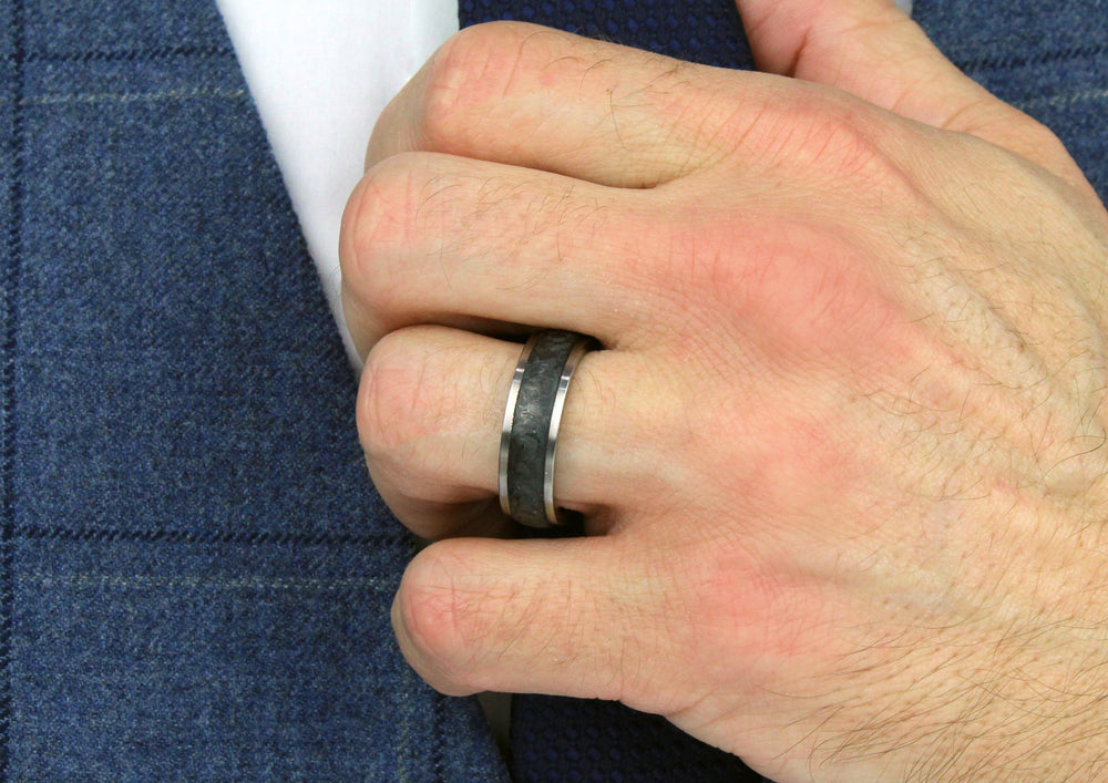 Model wearing Titanium & Black Carbon Fibre ring, 7mm wide, 3mm deep, Comfort court profile, Hypoallergenic, 52545/001/000/2050