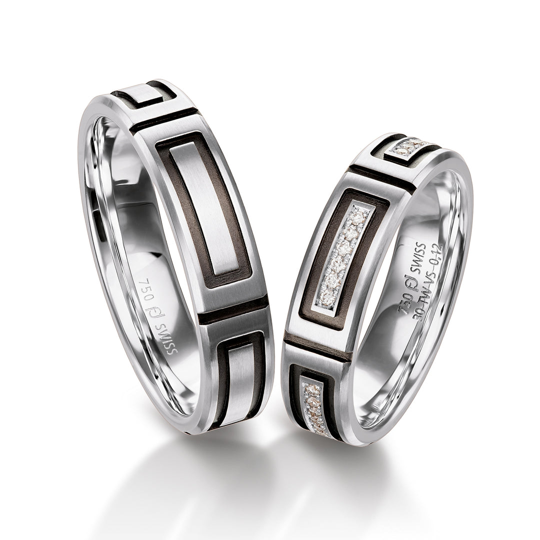 Pair of 18ct White Gold rings with Black Rhodium detailing, set with 12 x brilliant cut diamonds weighing 0.048ct (graded F/G VS) , Furrer Jacot 61-53170-2-0 & 71-32170