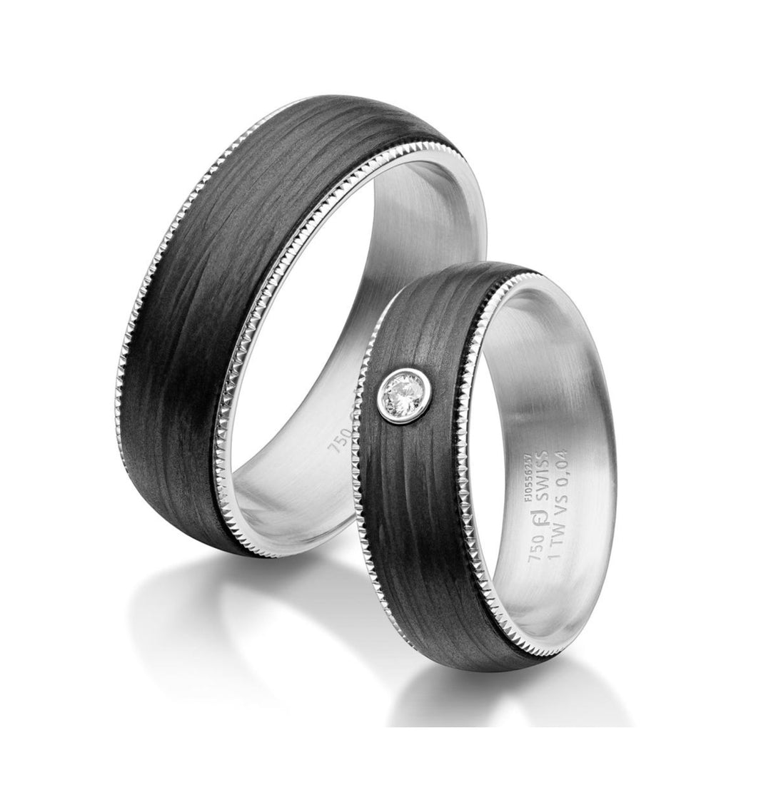 Pair of 6.5mm wide Platinum & Black Carbon Fibre rings; traditional court shaped profile with milgrain edging detail; diamond set ring features one brilliant cut round diamond weighing 0.04ct, graded F/G VS